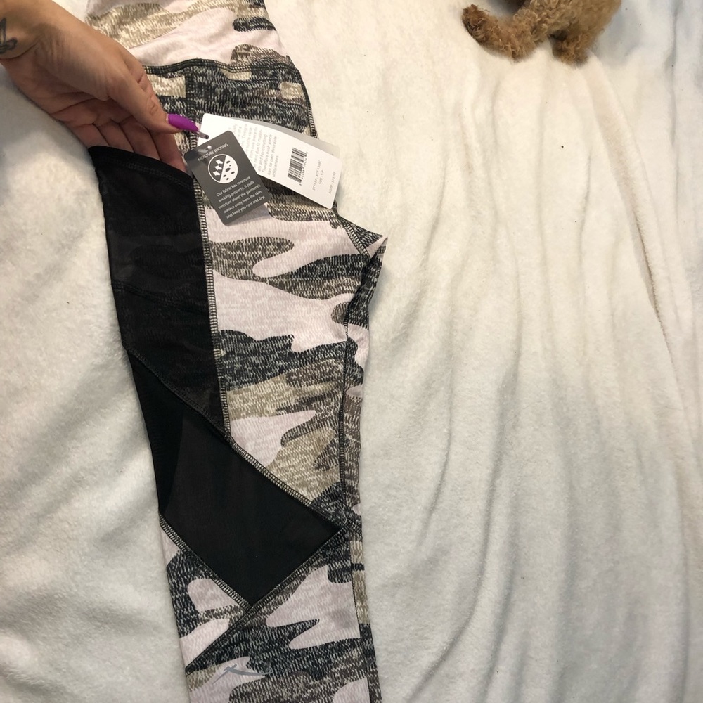 Brand new leggings with tags, mesh insert, small